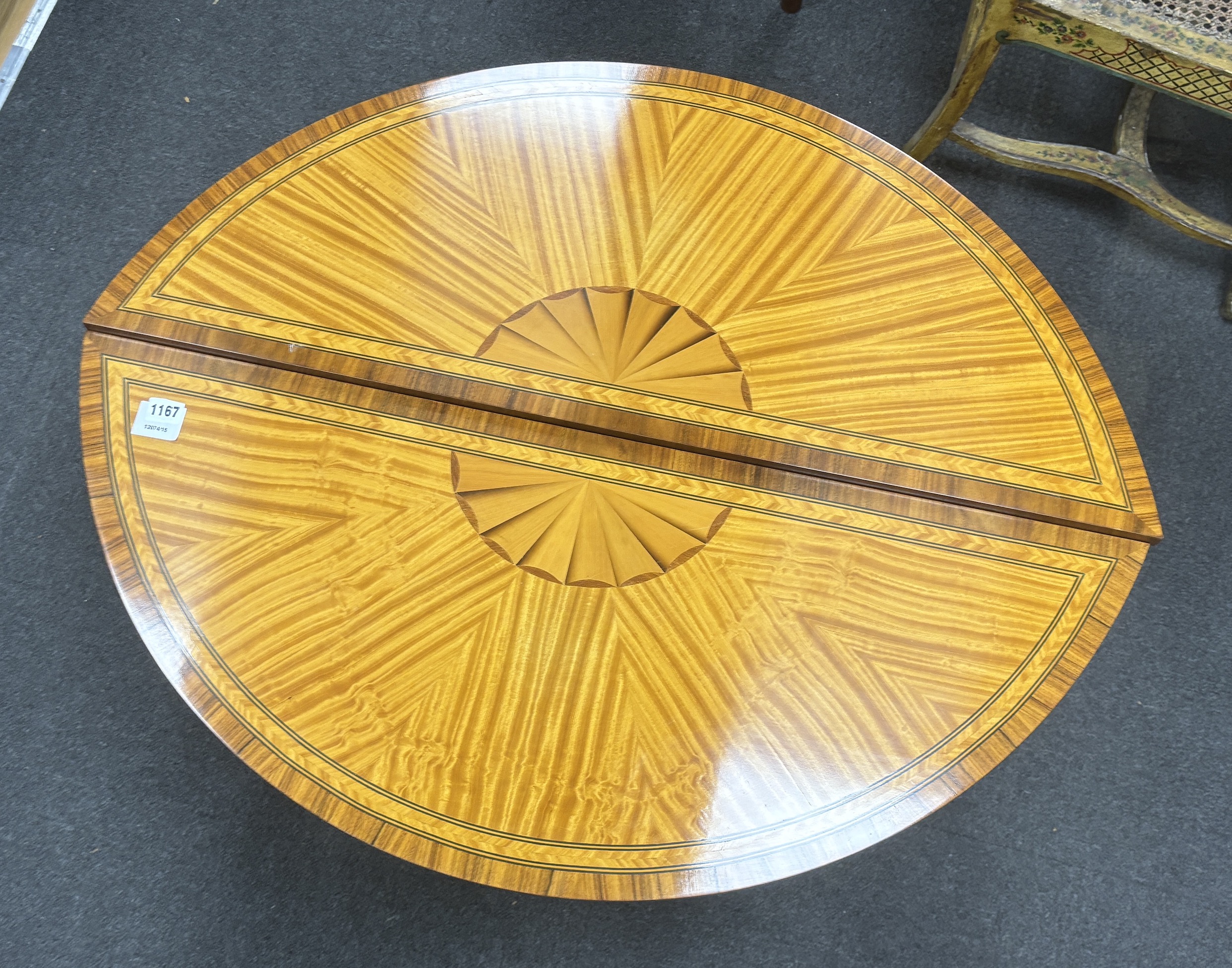 A pair of reproduction Sheraton style banded satinwood D shaped side tables, width 94cm, depth 39cm, height 73cm